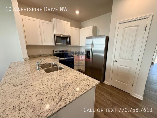10 Sweetspire Dr NW
