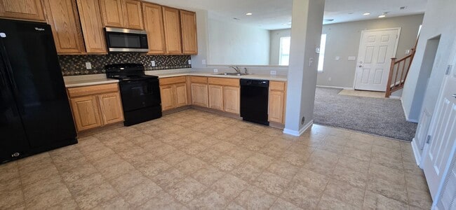 Photo - Charming 4-Bedroom home in Lochbuie, CO, features open Layout, private yard, open back patio + more!