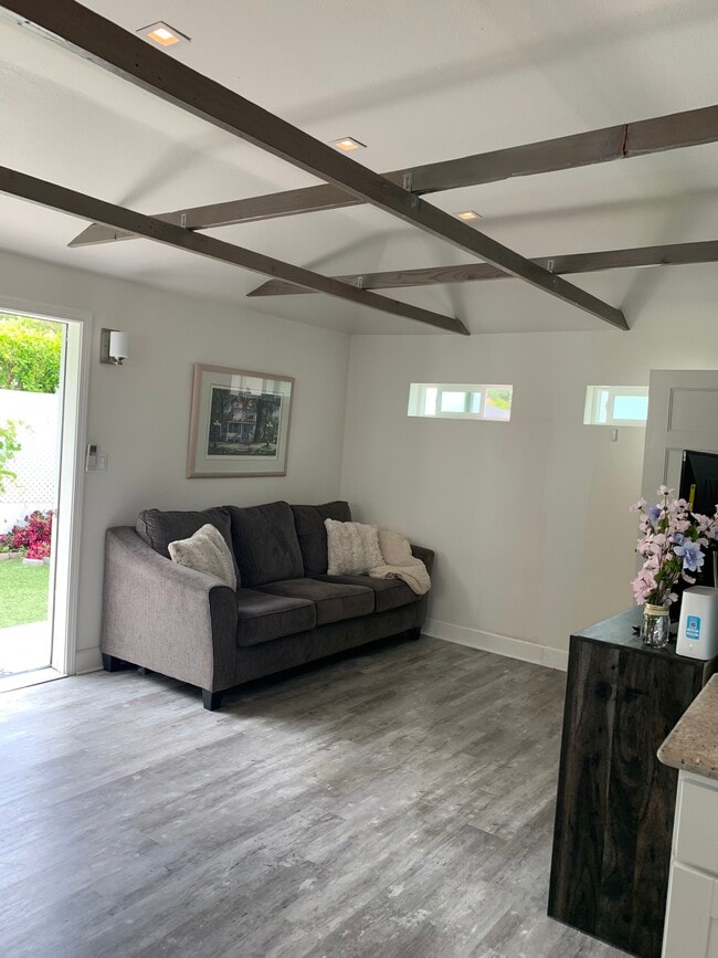 Living room with door to backyard