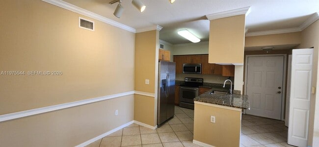 Photo - 6482 Emerald Dunes Dr Unit 201 PLUS GARAGE