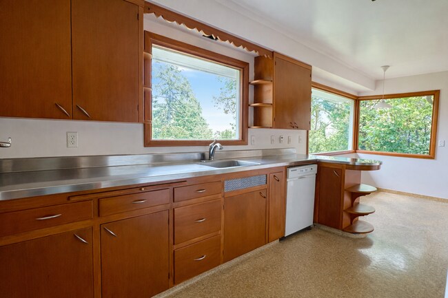 Photo - Charming 4 Bedroom Home with Fully Fenced Backyard!