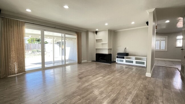 Photo - 4BD/3BA - Modern Home in Convenient Location: Updated Features, Near Parks & Shops, Pet-Friendly ...