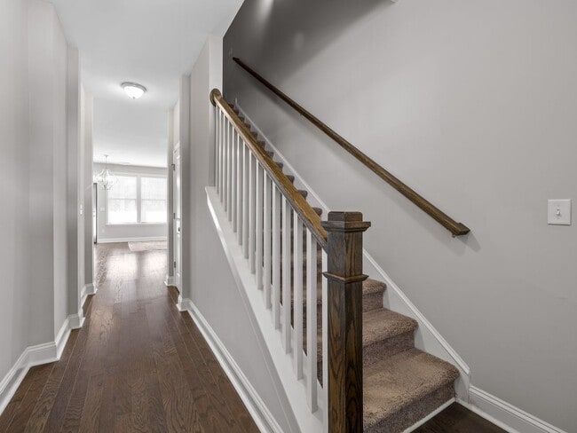 Photo - **MOVE IN SPECIAL! 50% off first month's rent!!** Spacious 4BR Townhouse with 2-Car Garage Near D...