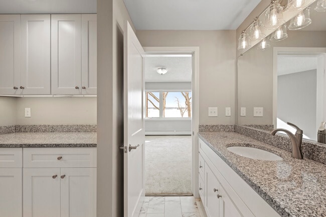 Lakeside updated bathroom and laundry area in unit