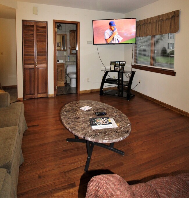 New hardwood floors and large flat screen TV - 115 River St Unit 115R1