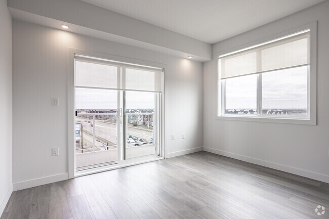 3BR, 2BA - 1034SF - Living Room - Heritage Flats