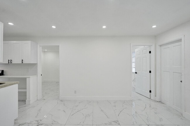 Unit 4 Livingroom/ kitchen - MAYO GARDENS APTS