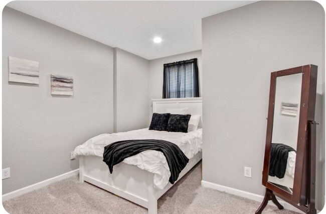 Photo - Furnished 3-Bedroom Apartment with Private Entrance and Free Laundry Unit 4