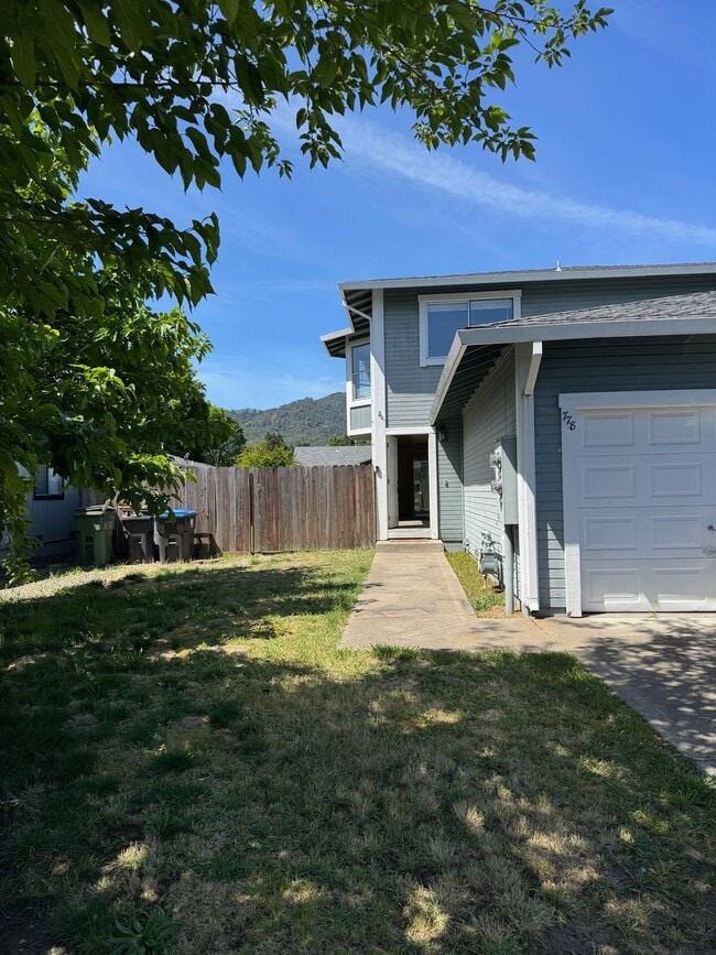 Photo - Charming 3 bedroom 1.5 bathroom Two story Town House with an attached garage.