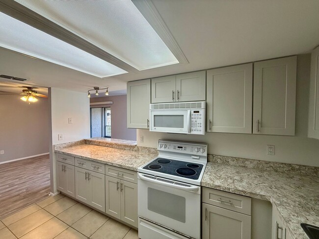 Photo - Open Concept 2bed 2bath updated condo centrally located in South Daytona for $1350 per Month! Unit H