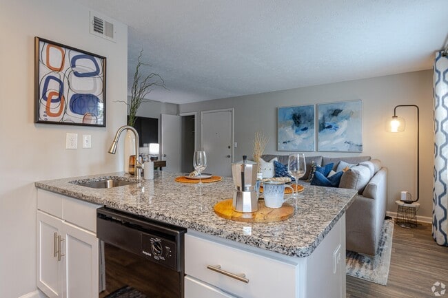 Kitchen with granite counters & deep stainless sink