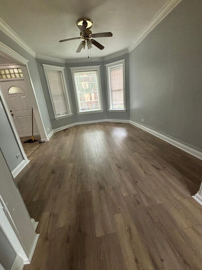 Photo - 1446 E 69th Pl Casa