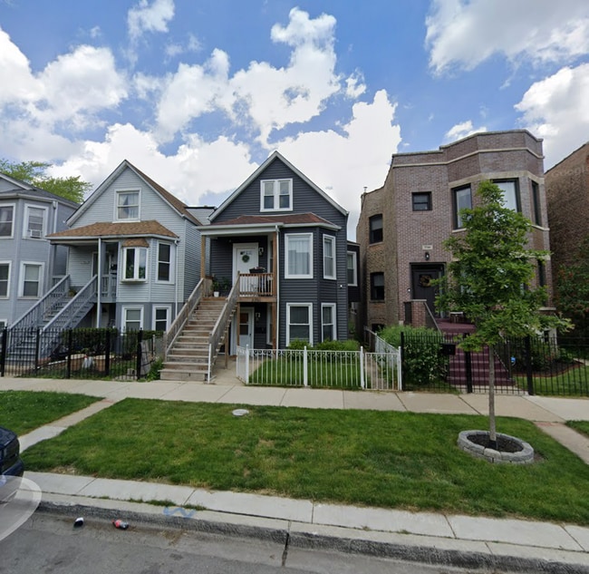 UPDATED siding - 3350 W Cuyler Ave Unit 1