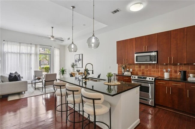 Photo - 711 Cosmopolitan Dr NE Unit 102