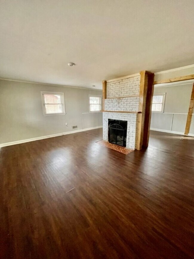 Photo - Adorable 3-bed 2-bath brick ranch, sitting on nearly a half acre lot, is located in Gastonia