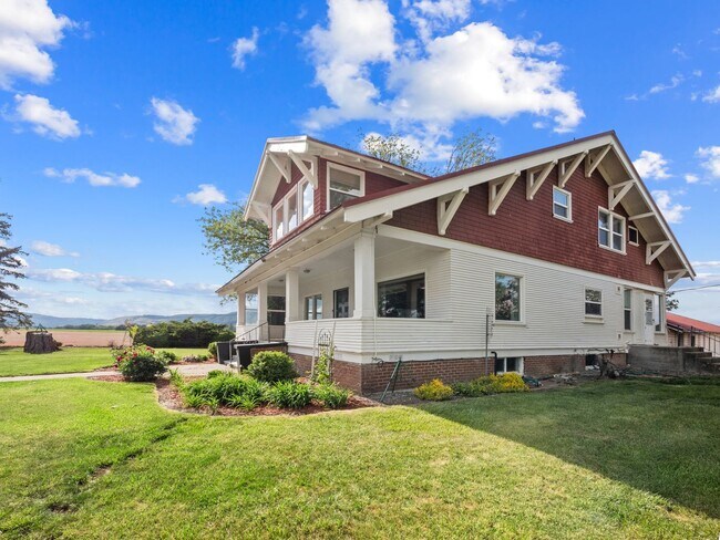 Photo - Beautiful craftsman style farmhouse outsid...