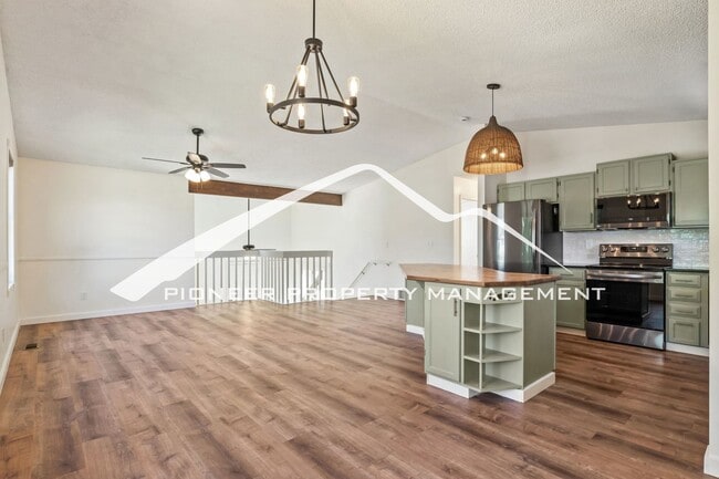 Photo - Updated 4 Bed, 2 Bath Home in Briargate with Mountain Views, fully fenced yard, 2 car garage and AC