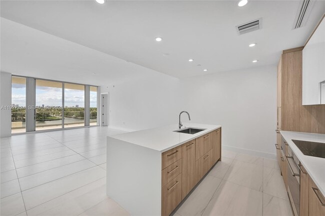 Building Photo - 153 N Seabreeze Blvd Unit 503-S