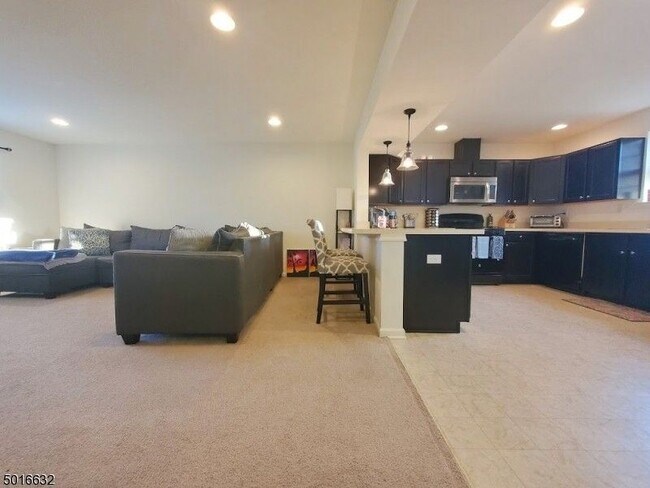 Open Layout Living room and Kitchen - 12 Alfred Ave Townhome