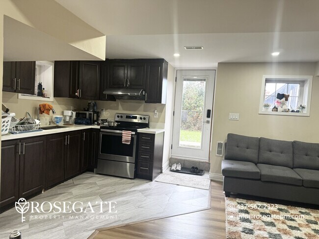 Photo - Spacious 3-Bedroom + Den Walk-Out Basement... Unit 2