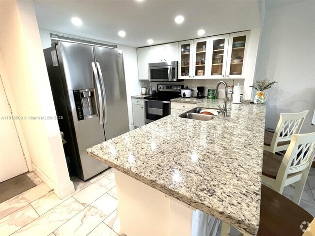 Building Photo - 3099 NW 48th Ave Unit 359 Rental