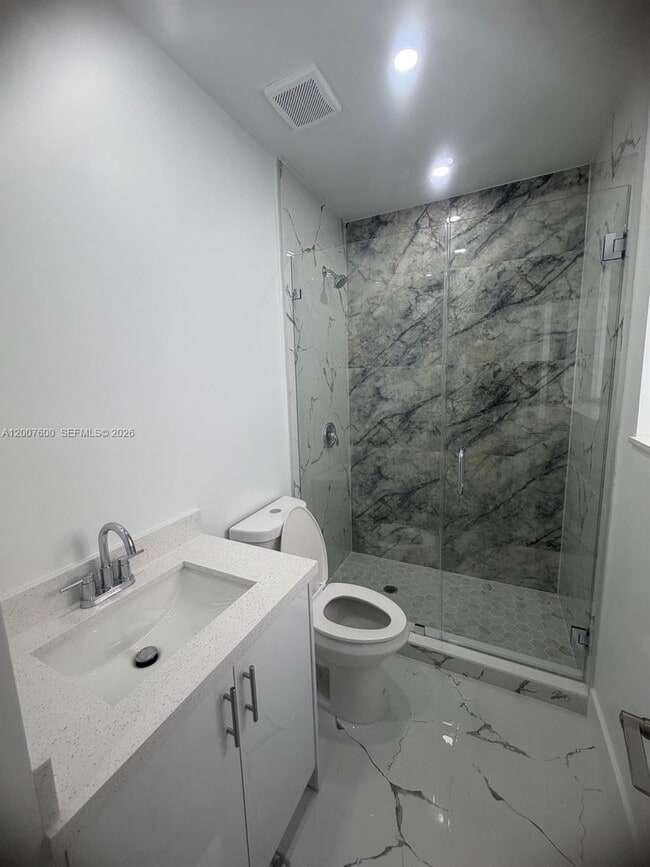 Building Photo - 2431 NW 23rd St Unit 1