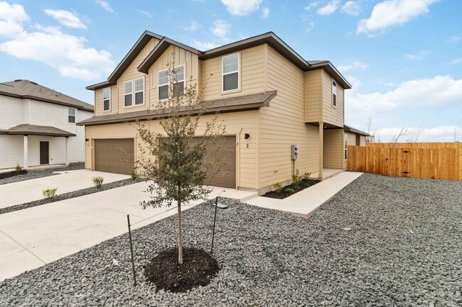 Photo - Brand-New 2-Story Townhome with Large Private Yard & 2-Car Garage