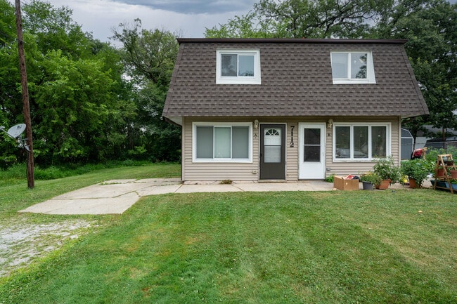 Building Photo - 7112 W 137th Ln Unit A Rental