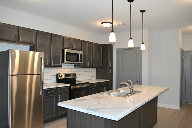 Two Bedroom Kitchen - The Jewel Summit Pointe Apartments