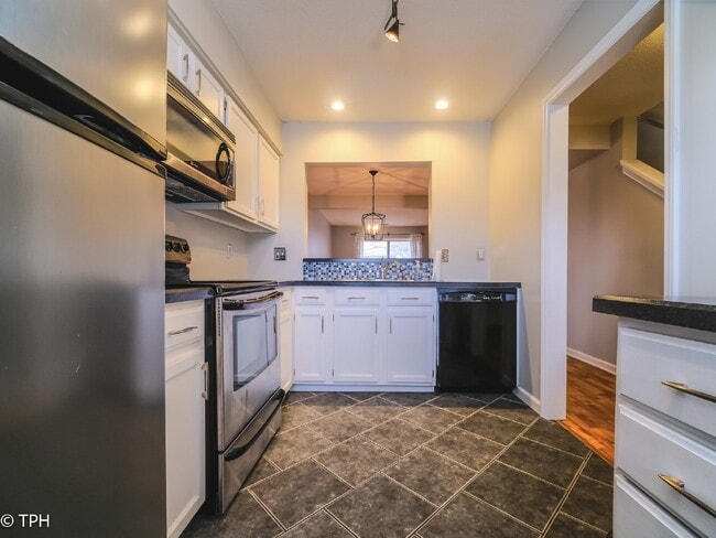 Photo - "Charming 2-Bedroom Gem with Granite Elegance in Charlotte's Heart!"