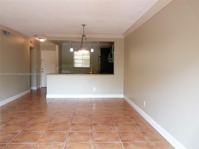 Building Photo - 7701 Camino Real Unit A202