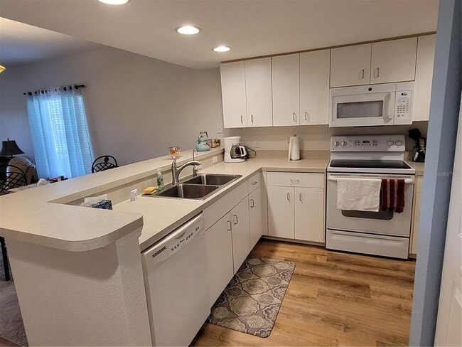 Photo - 9550 Fiddlers Green Cir Unit 105