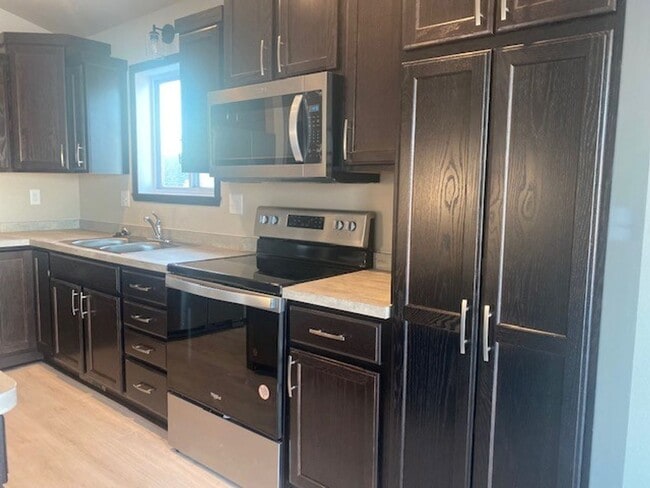 Photo - Modern 3 Bedroom Home with Garage & Fenced Yard for Rent!