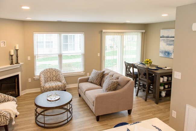 Phase II Great Room with living area, fireplace, & dining area