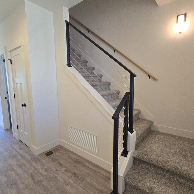 Photo - Move-in ready! 4 bedroom house with 3 car ... Unit (Cottage Gardens)