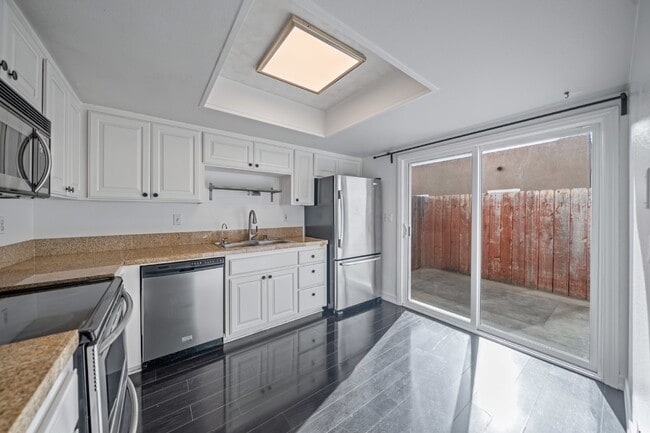 Photo - North Park 3 bd / 2.5 ba 2-story Townhome w/Private Patio Yard, Parking, + More! Available Now