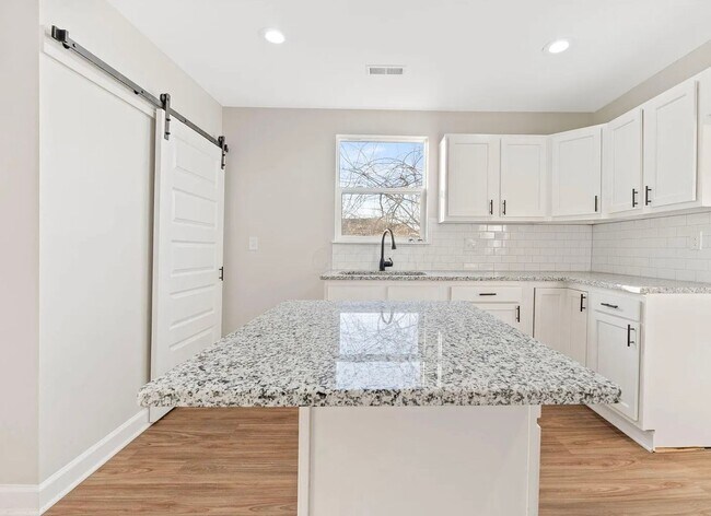 Photo - Elegant 3 Bedroom Home with First-Floor Laundry and Modern Style