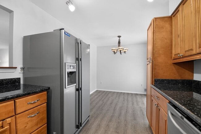 Photo - Welcome home to this light-filled, updated 4Bd/3.5Bth brick TH nestled in the sought-after Boniwo...