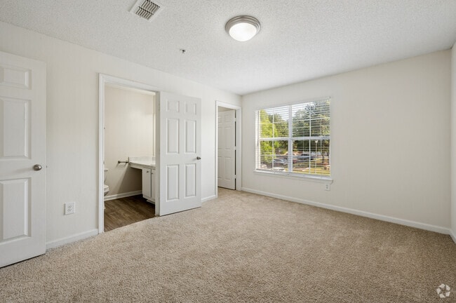 2BR, 2BA - 1,130SF - Primary Bedroom