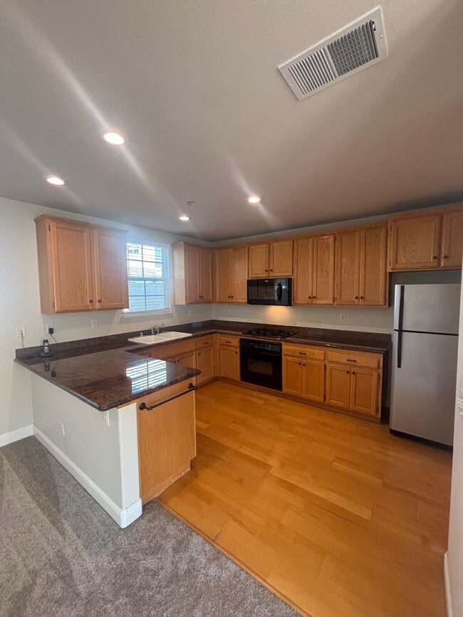 Photo - 2 bedroom 2.5 Bathroom Windsor Town Green Condo with carpet and A/C