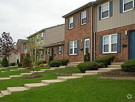 Building Photo - Squire Village Apartments