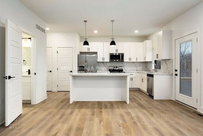 Highly sought after Ayden Place Duplexes with a 2-Car Garage in Kansas City!