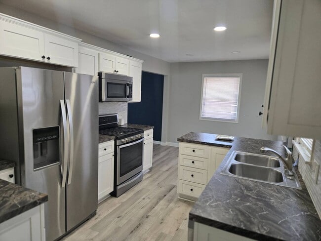 Photo - Charming 5-Bedroom Property in Prime Location