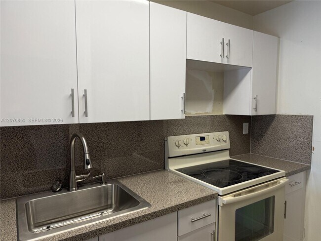 6055 W 19th Ave Unit 311