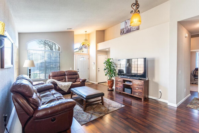 Living Room with Large Window & front door entrance - 9316 Caulfield Dr Rental