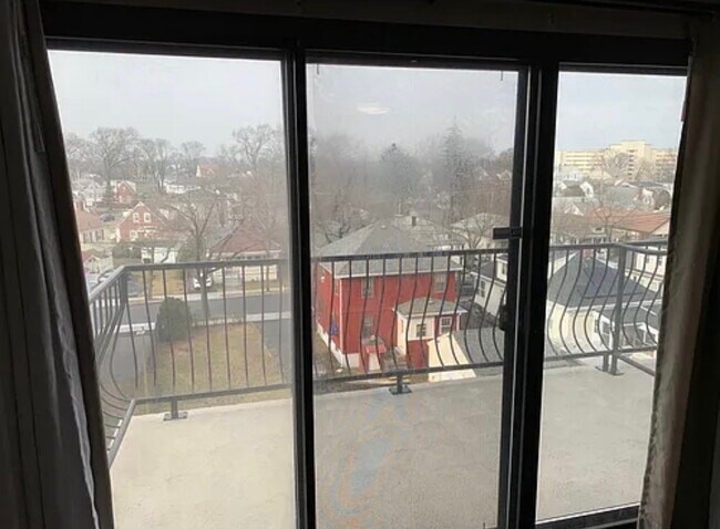 Balcony (overlooks 2 deeded parking spots, sometimes see fireworks during holidays) - 500 Washington St Unit 502