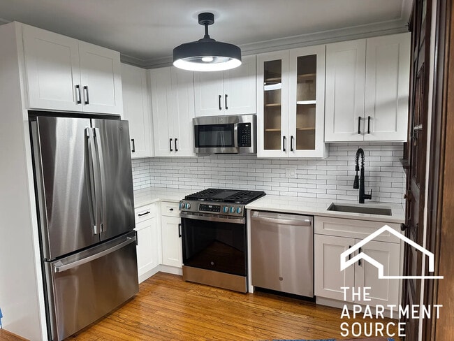 Building Photo - 3126 N Spaulding Ave Unit 3E