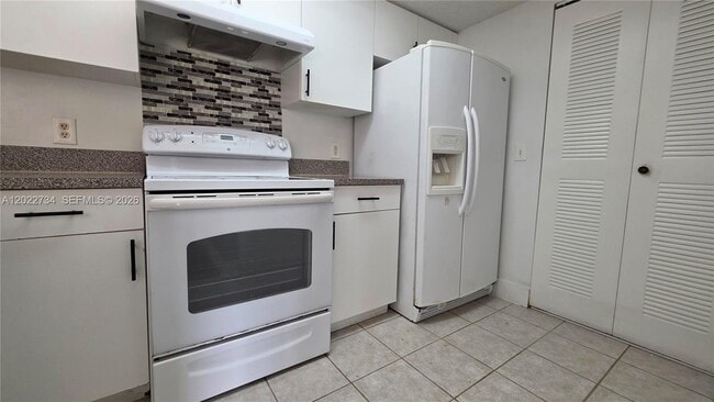 Photo - 5011 Wiles Rd Unidad 203