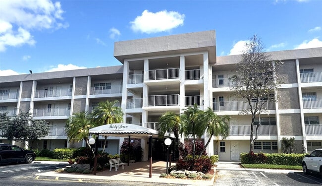 Building Photo - 3351 S Palm Aire Dr Unit 205