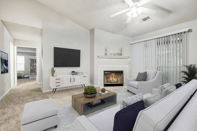 Manchester at Wesleyan Living Room with Fireplace - Manchester at Wesleyan Apartments